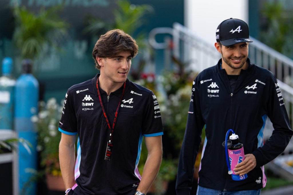 Jack Doohan of Australia and Alpine F1 team and Esteban Ocon of France and Alpine F1 team walk in the paddock during practice ahead of the F1 Grand...