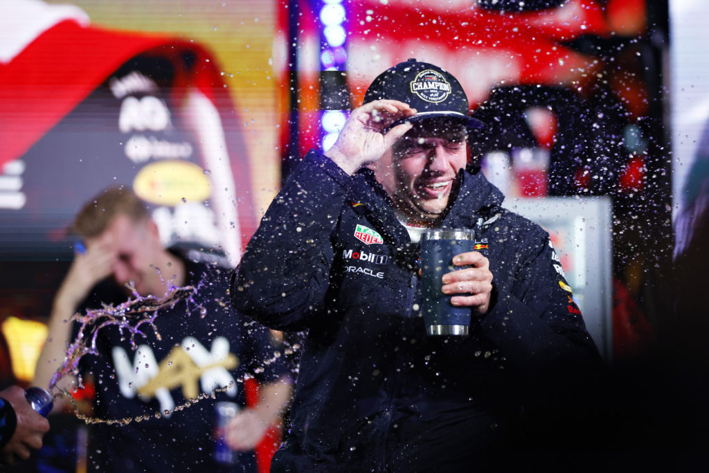 gettyimages-2186600134-1024x683-1 2024 F1 World Drivers Champion Max Verstappen of the Netherlands and Oracle Red Bull Racing celebrates with his team in the Paddock after the F1 Gr...