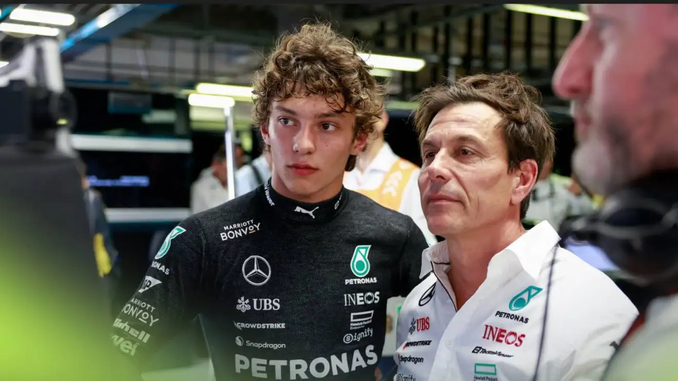 c-678 Andrea Kimi Antonelli stands alongside Toto Wolff in the Mercedes garage at Monza