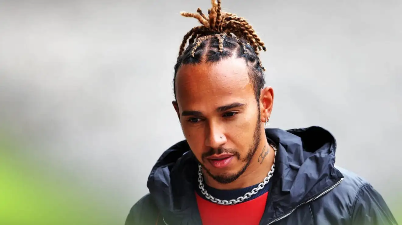 c-735 Lewis Hamilton wearing red clothing