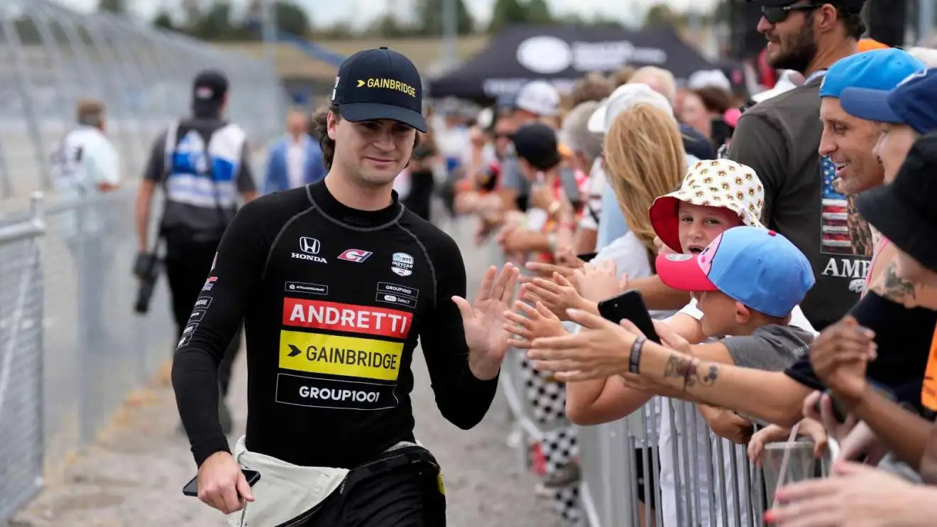 c-774 IndyCar driver Colton Herta greets fans.