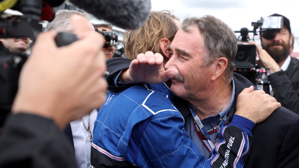 gettyimages-1406521302-1024x576-1 Sebastian Vettel of Germany and Aston Martin F1 Team and Nigel Mansell embrace after the outing of the 1992 Williams FW14B on track prior to the F1...