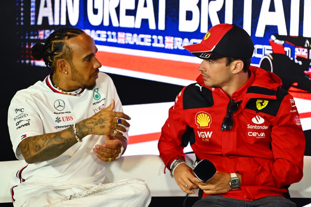 gettyimages-1519392342-1-1024x683-1 Lewis Hamilton of Great Britain and Mercedes and Charles Leclerc of Monaco and Ferrari talk in the Drivers Press Conference during previews ahead o...