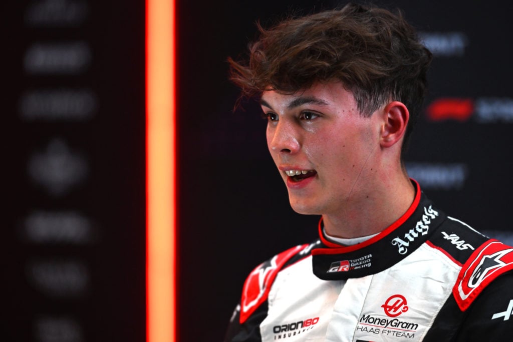 gettyimages-2182341010-1024x683-1 10th placed qualifier Oliver Bearman of Great Britain and Haas F1 talks to the media in the Paddock after Sprint Qualifying ahead of the F1 Grand P...