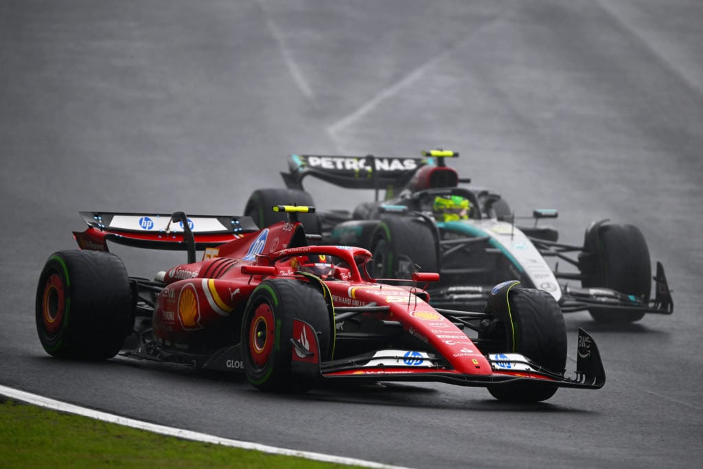 gettyimages-2182678061-1024x683-1 Carlos Sainz of Spain driving (55) the Ferrari SF-24 leads Lewis Hamilton of Great Britain driving the (44) Mercedes AMG Petronas F1 Team W15 on tr...