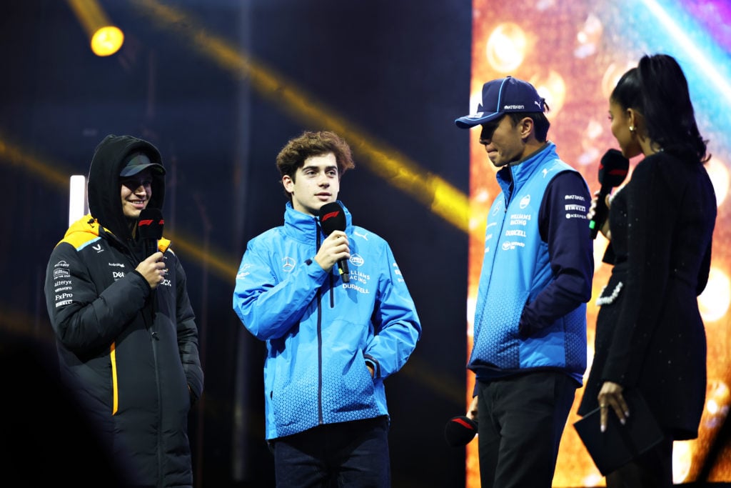 gettyimages-2186033963-1024x683-1 Lando Norris of Great Britain and McLaren, Franco Colapinto of Argentina and Williams and Alexander Albon of Thailand and Williams talk to the crow...