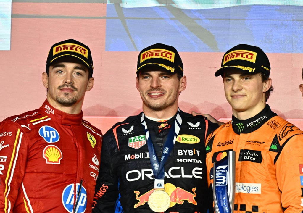 gettyimages-2187410548-1024x720-1 The winner, Red Bull Racing driver Max Verstappen of the Netherlands (C), second-placed Scuderia Ferrari driver Charles Leclerc of Monaco (L), and ...