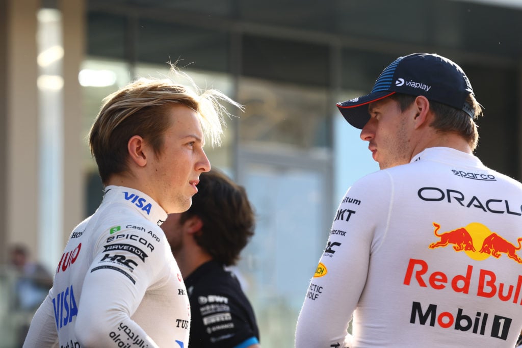 Liam Lawson of New Zealand and Visa Cash App RB talks to Max Verstappen of the Netherlands and Oracle Red Bull Racing prior to the F1 Grand Prix of...
