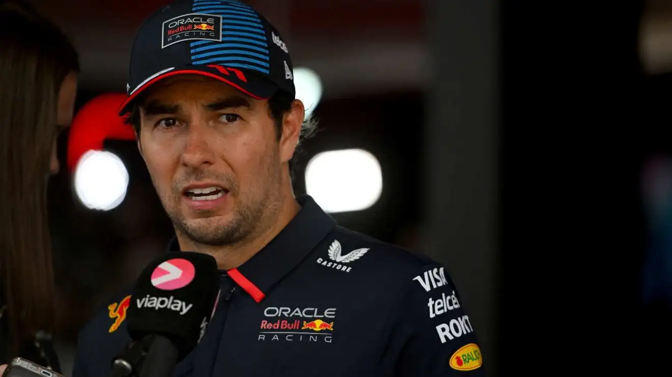 Sergio Perez of Red Bull Racing gives an interview during the Austrian Grand Prix