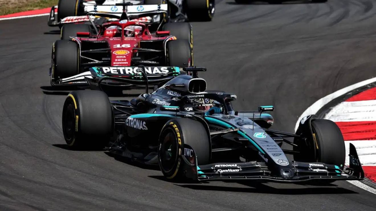 c-1732 George Russell, Mercedes, ahead of Charles Leclerc in the Ferrari at the 2025 Chinese Grand Prix