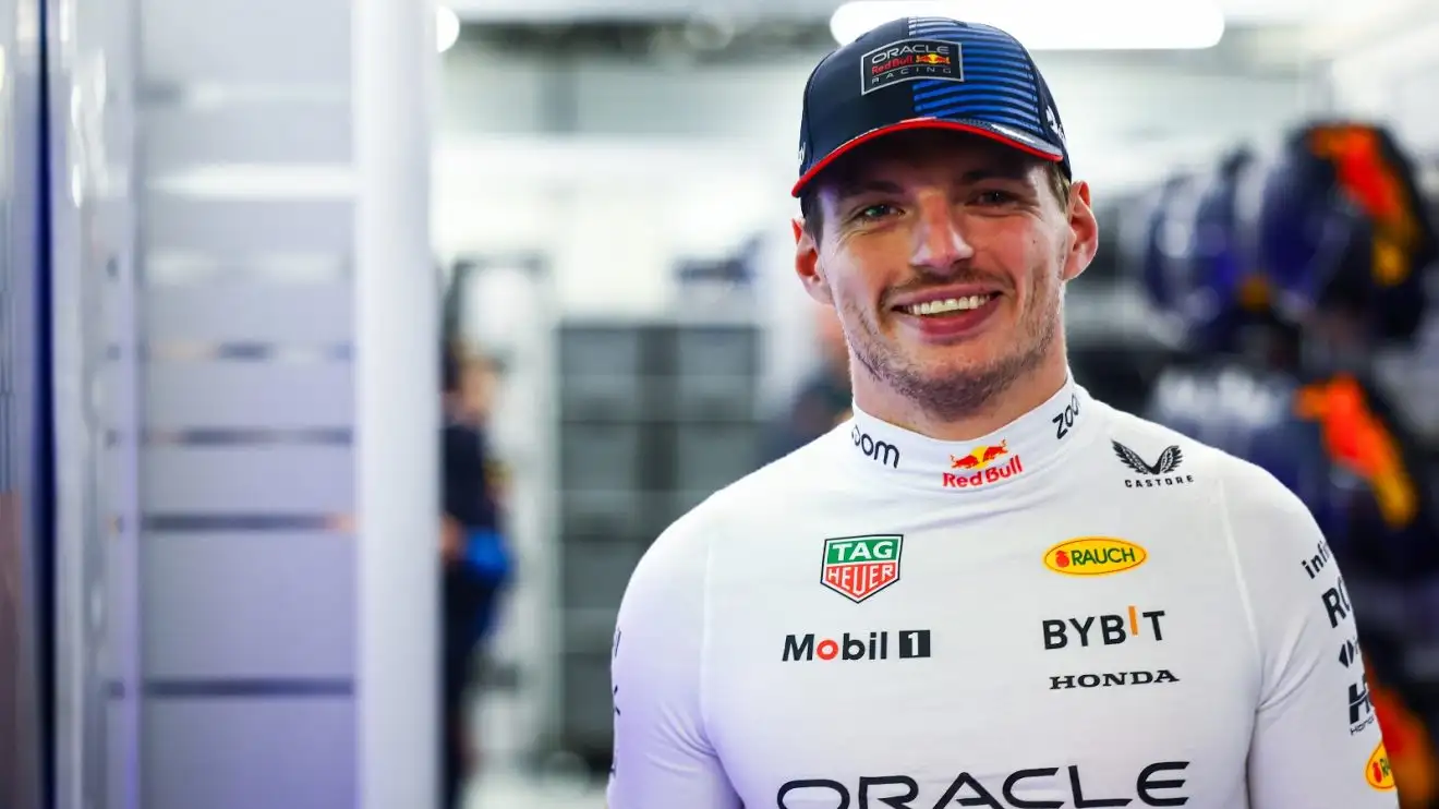 c-277 Max Verstappen smiles in the garage