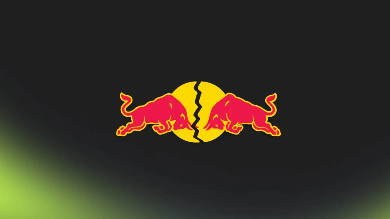 c-364 A Red Bull logo on a black background with a large crack running through the middle