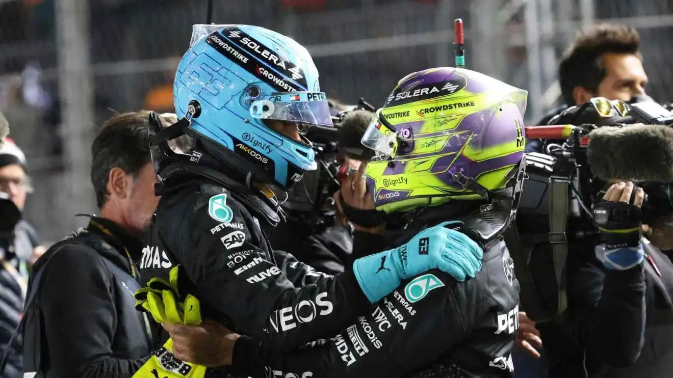 George Russell and Lewis Hamilton celebrate in Las Vegas.