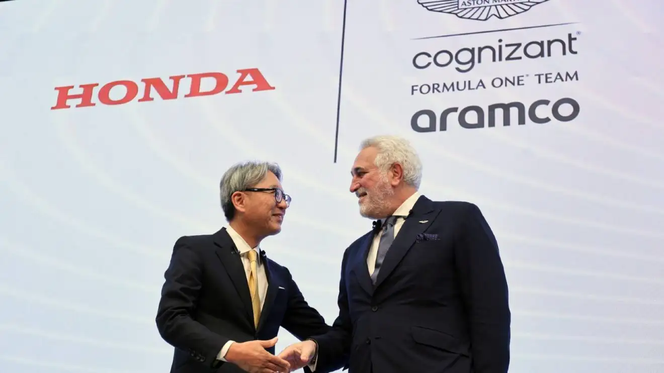 c-430 Aston Martin's Lawrence Stroll with Honda's Toshihiro Mibe.