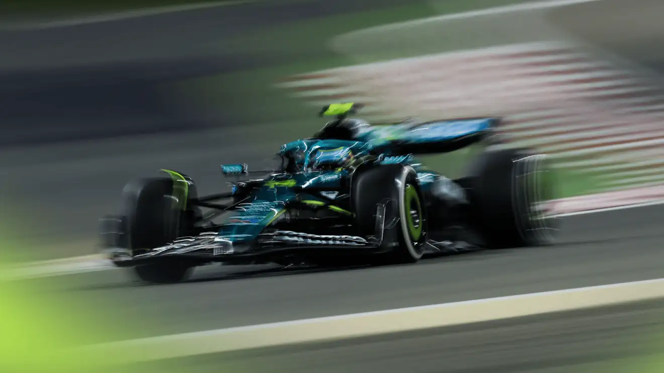 c-457 A blurry action shot of Fernando Alonso on track in Bahrain