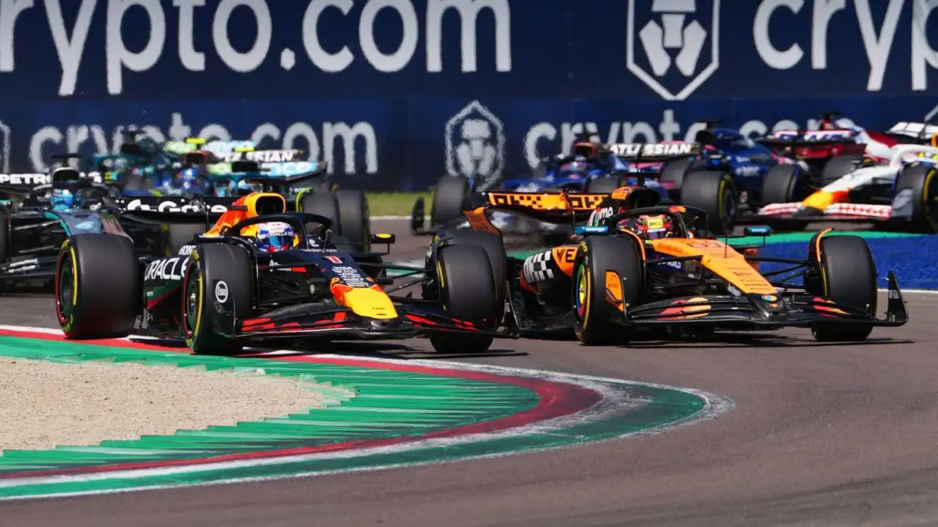 c-1029 Max Verstappen drives around the outside of Oscar Piastri at the first chicane to take the lead of the Emilia Romagna Grand Prix.
