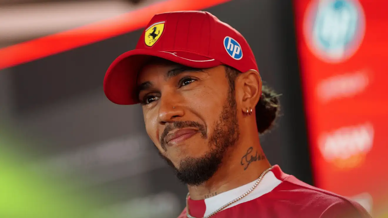 c-1173 Lewis Hamilton smiles as he faces the media at Imola