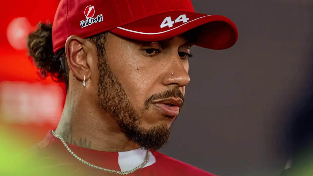 c-1203 Lewis Hamilton looks down as he speaks to the media at Imola