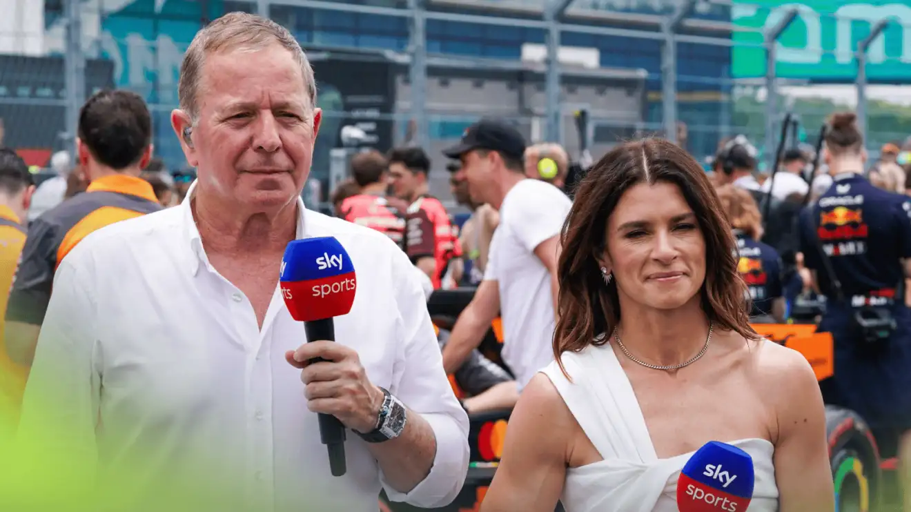 c-1221 Martin Brundle stands alongside Danica Patrick during a Sky F1 broadcast at the Miami GP