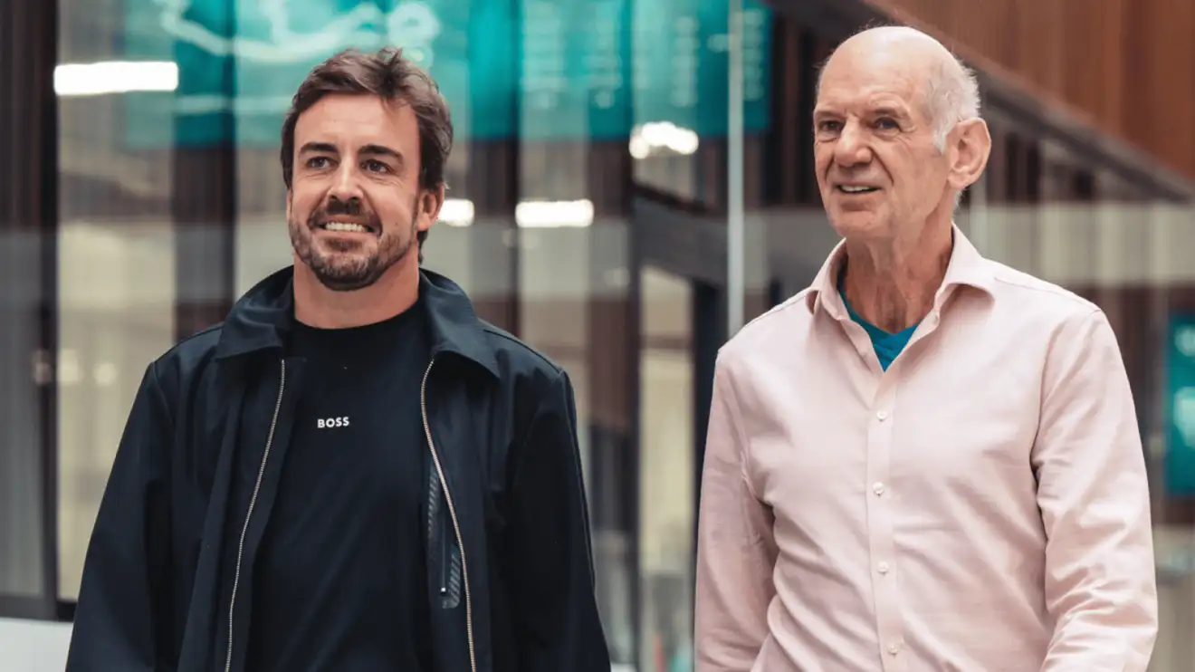 c-1230 Fernando Alonso and Adrian Newey walking side by side in the Aston Martin factory
