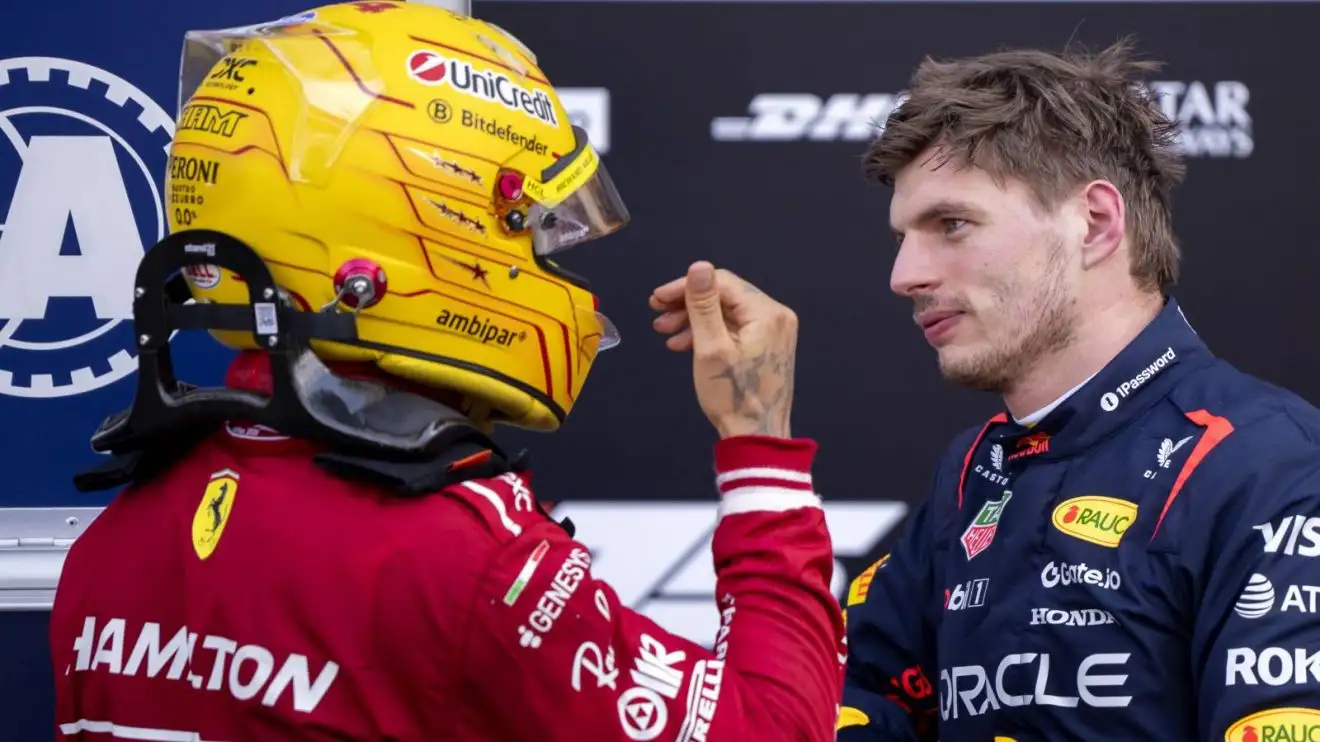 c-1398 Lewis Hamilton and Max Verstappen in discussion after qualifying for the 2025 Monaco Grand Prix