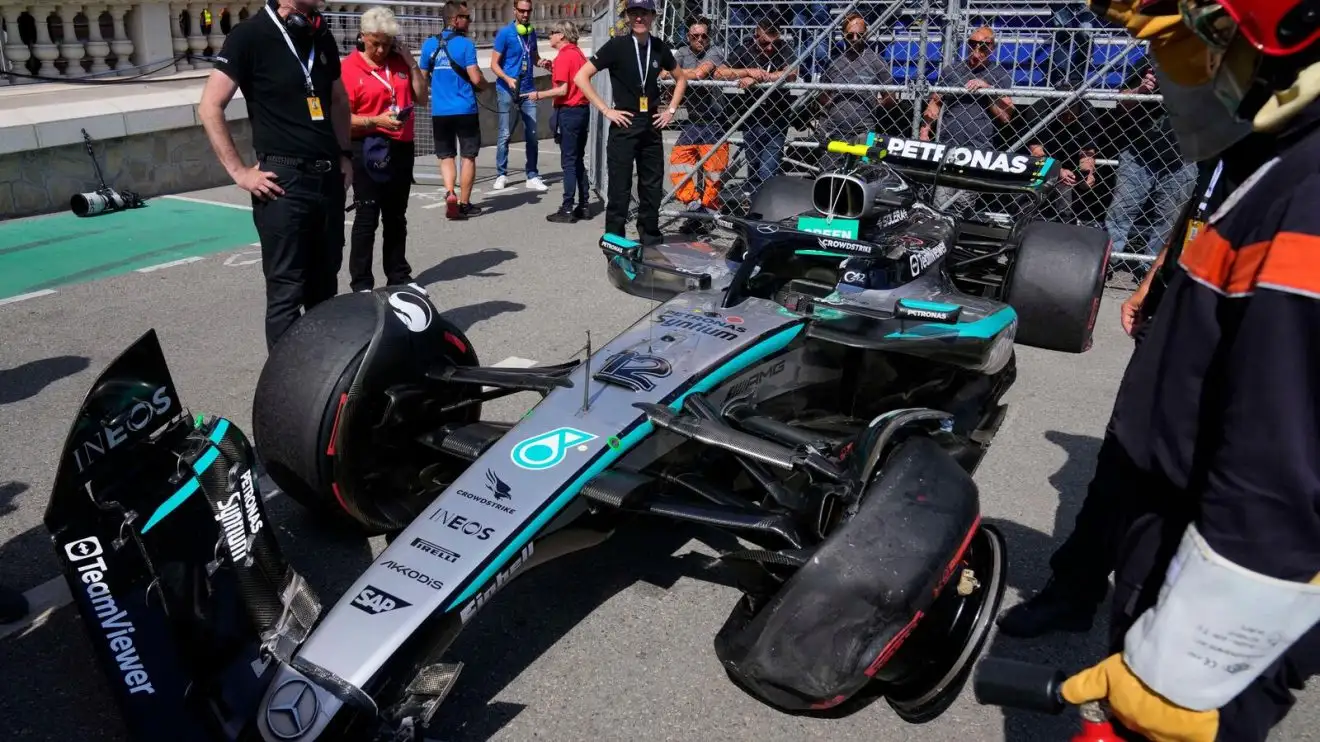 c-1404 Marshals inspect the car of Mercedes driver Andrea Kimi Antonelli of Italy after a crash during the qualifying session ahead of the Formula One Monaco Grand Prix.
