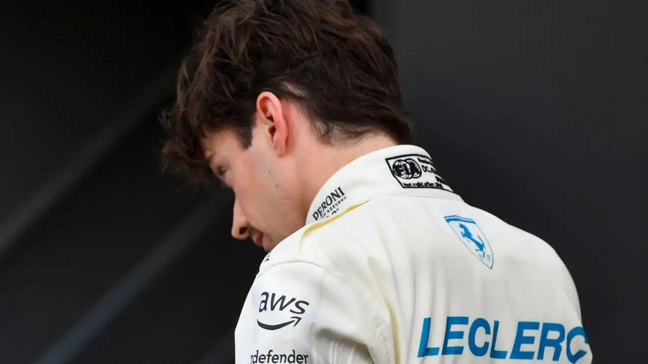 c-1431 Ferrari's Charles Leclerc with his back to the camera at the 2025 Monaco Grand Prix