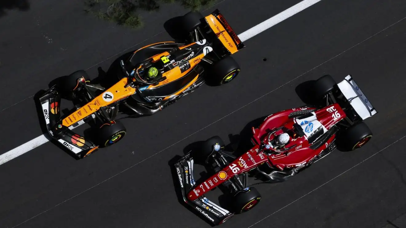 c-1463 Seen from overhead, Lando Norris and Charles Leclerc race side-by-side during the Monaco GP.