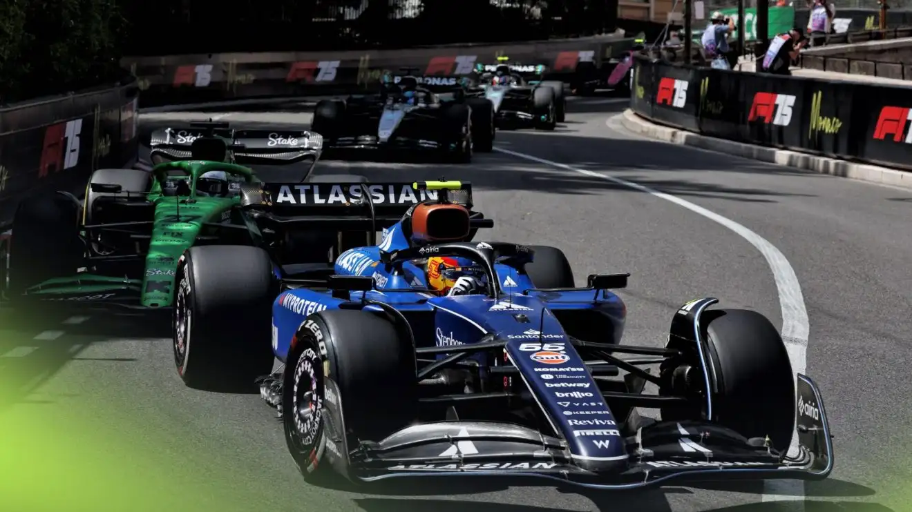 c-1478 Carlos Sainz in the Williams leads a train of cars at the 2025 Monaco Grand Prix