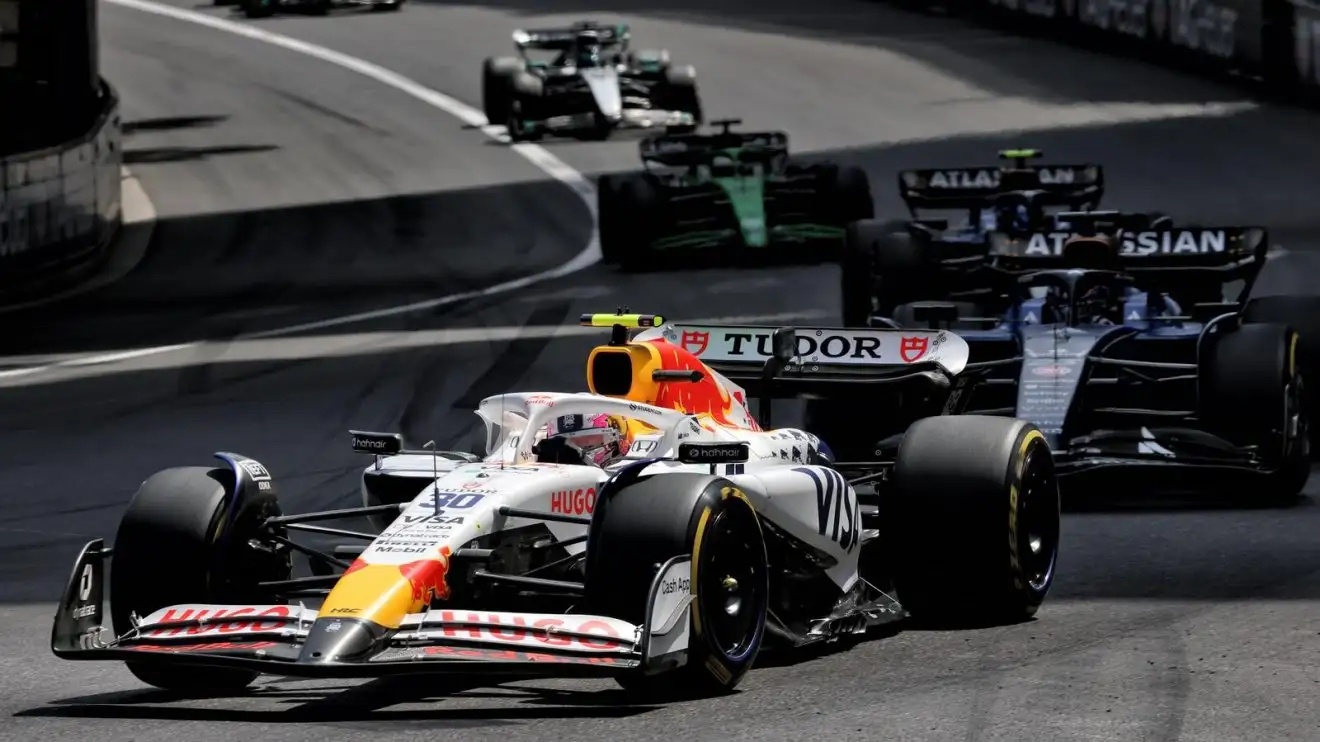 c-1484 Liam Lawson heads a track of cars into Sainte Devote during the Monaco Grand Prix.