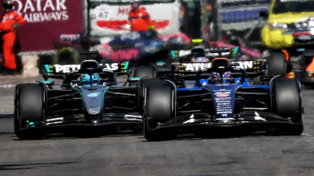 c-1505 Alex Albon narrowly leads George Russell on the run towards Tabac during the Monaco Grand Prix.