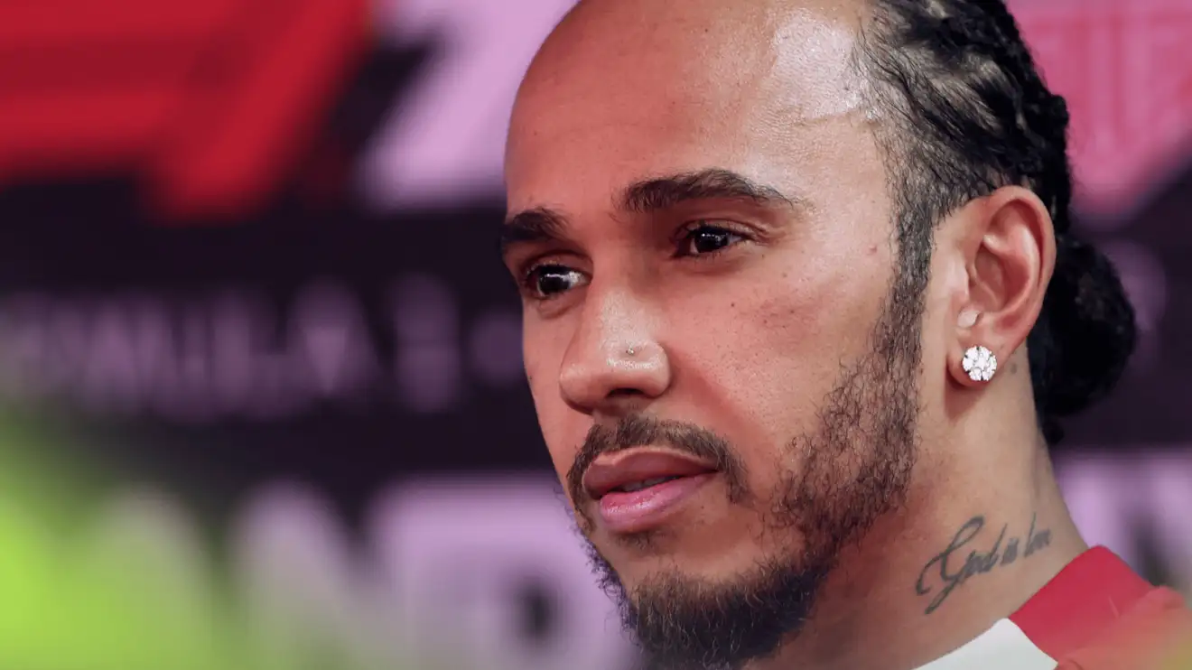 c-1577 A close-up shot of Lewis Hamilton facing the media