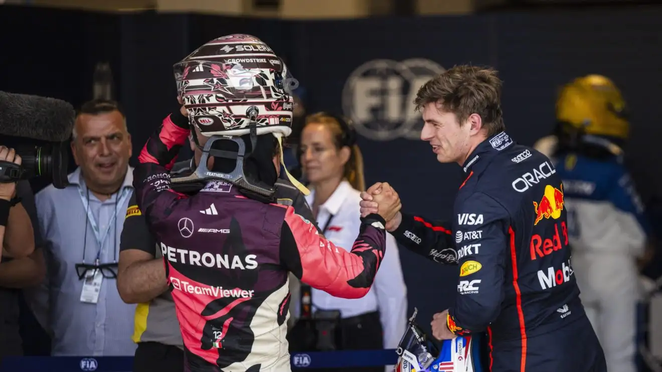 c-163 Max Verstappen congratulates Kimi Antonelli