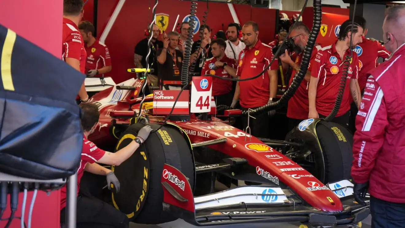 c-1780 Lewis Hamilton in the Ferrari garage