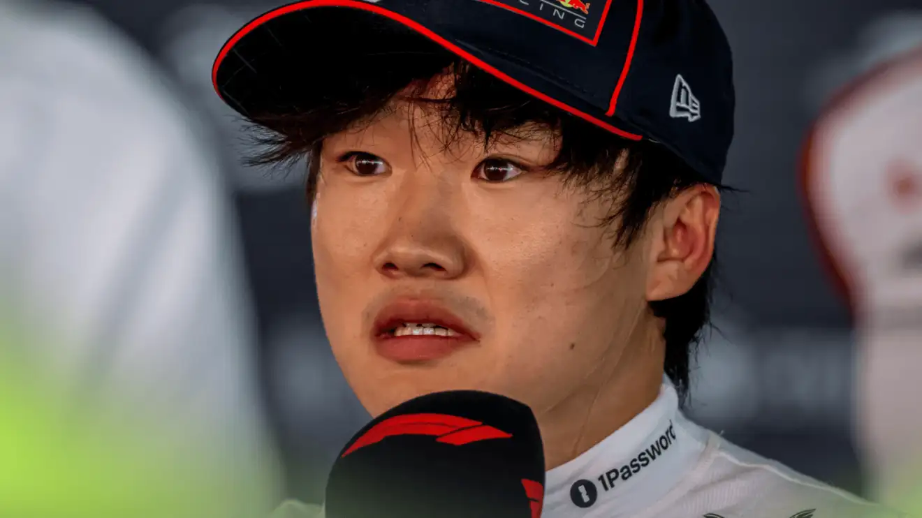 c-1831 Yuki Tsunoda looks anguished as he faces the media in Spain
