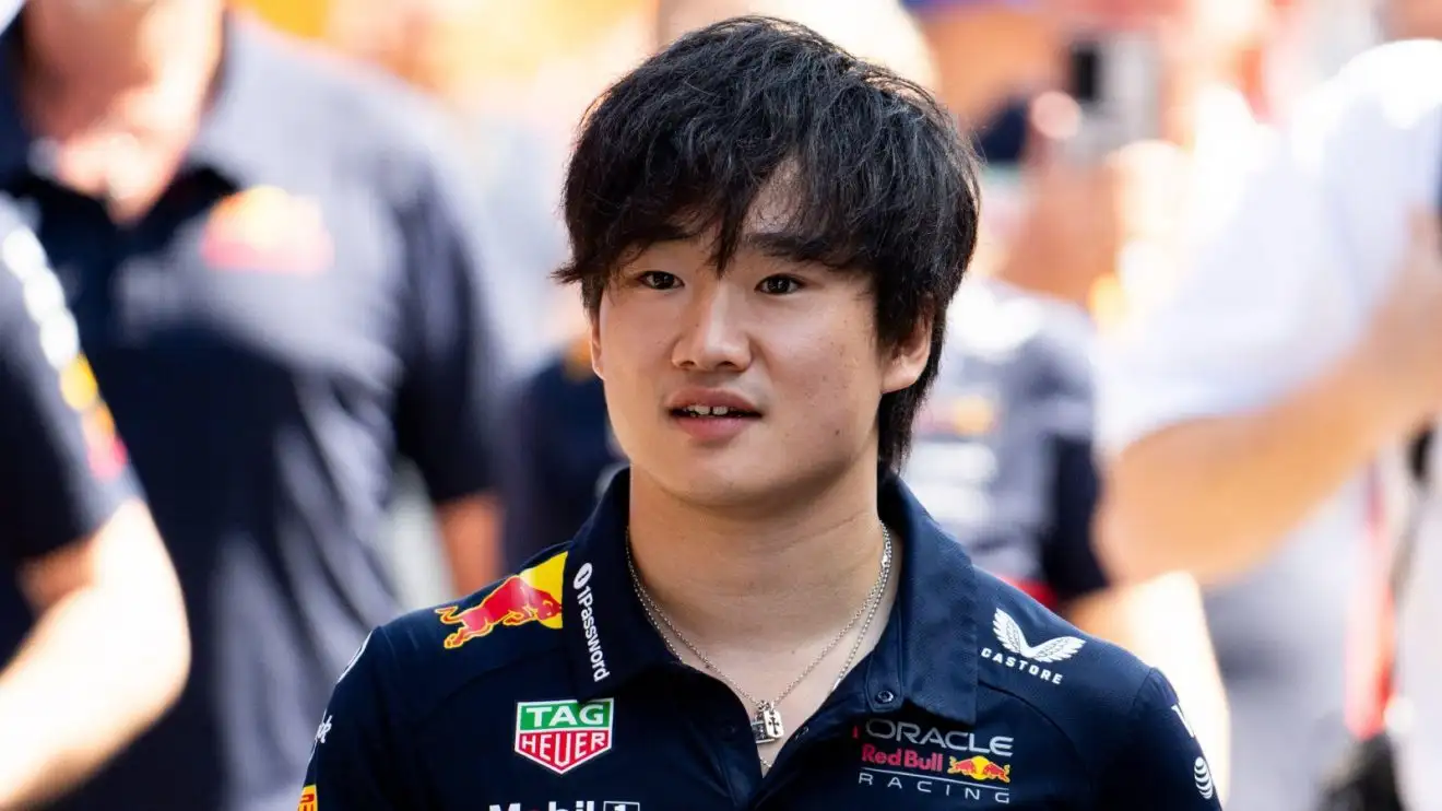 c-1840 Yuki Tsunoda walked through the paddock at the Spanish Grand Prix.