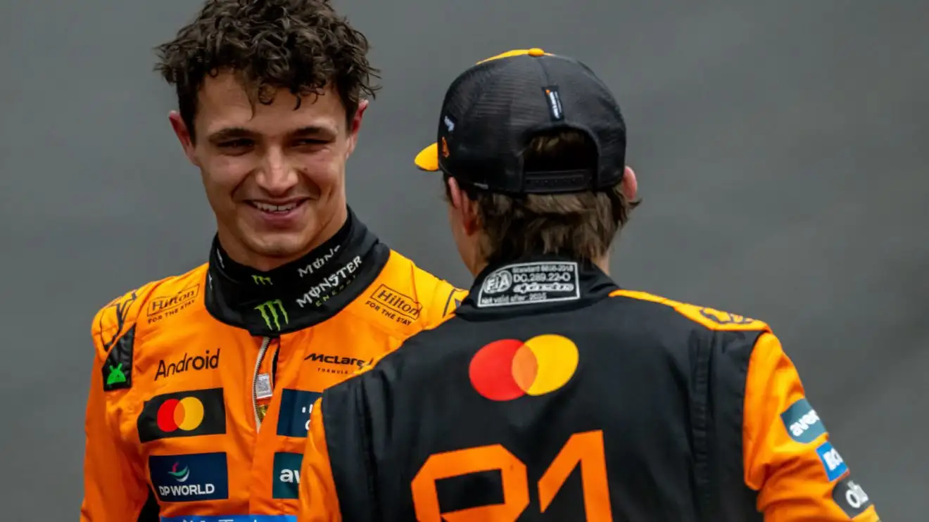 c-187 Lando Norris smiling with Oscar Piastri
