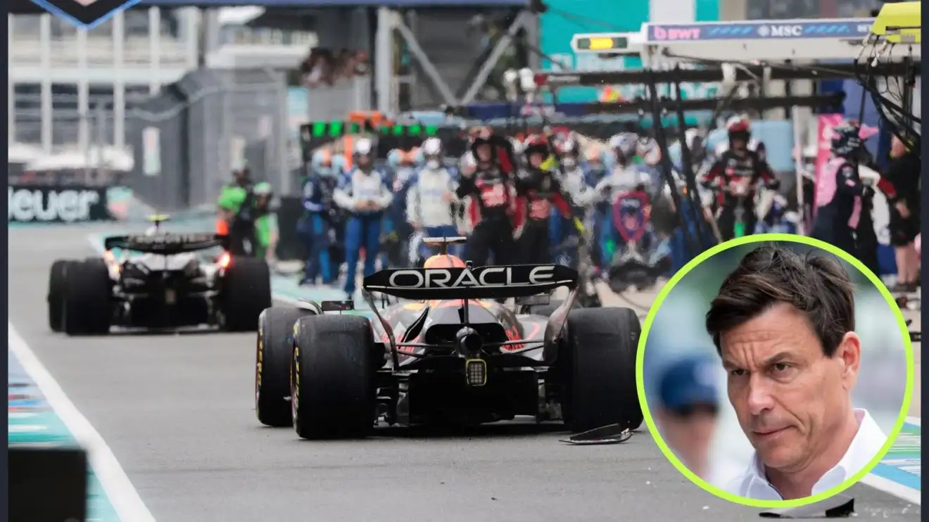 c-193 Max Verstappen drives down the pit lane after colliding with Kimi Antonelli, as a stern Toto Wolff looks from a circle bottom right