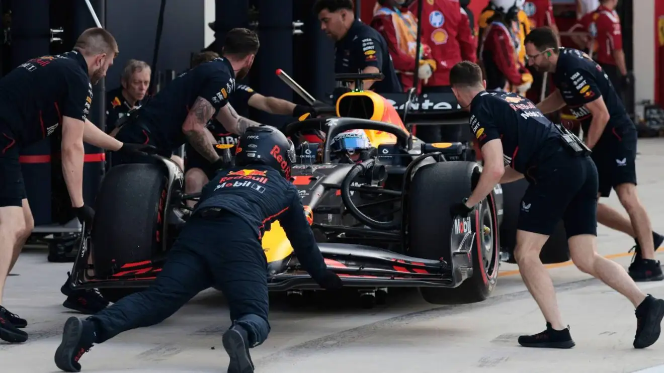c-217 Red Bull push Max Verstappen in the RB21 back into the garage at the Miami Grand Prix