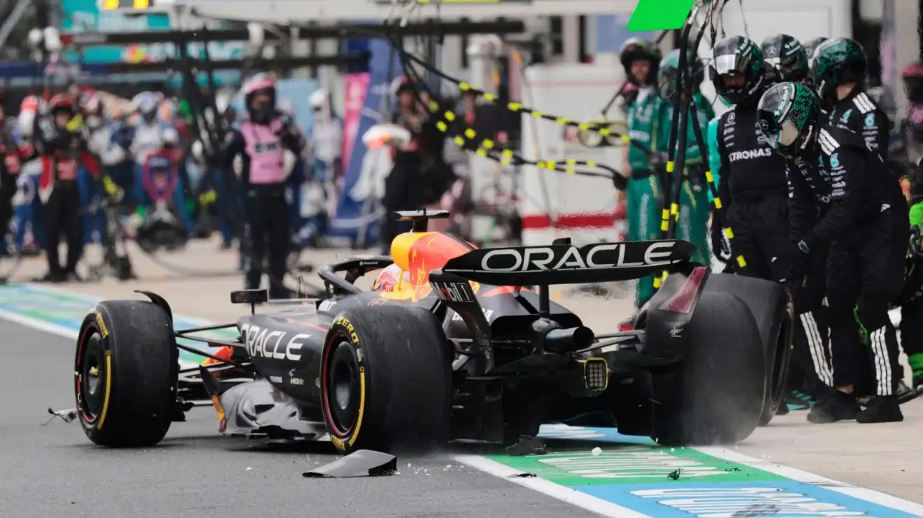 c-244 Max Verstappen with debris around him