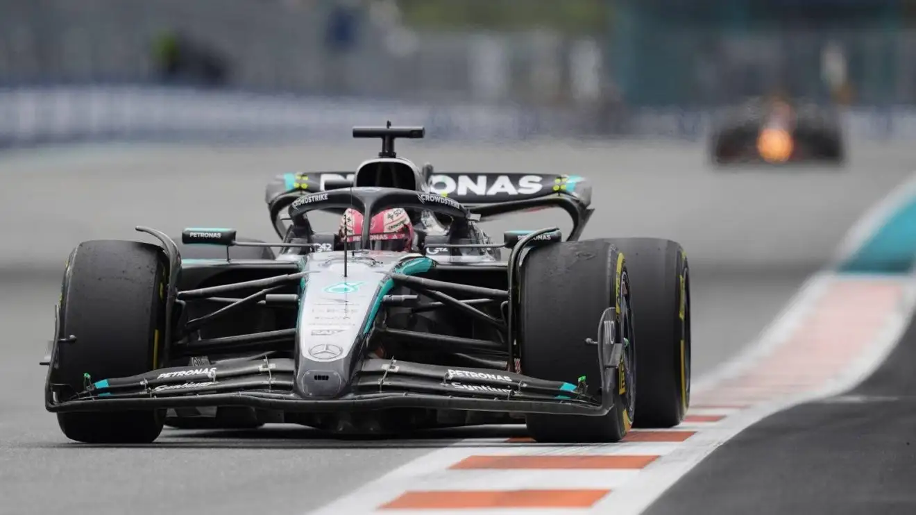 c-279 Mercedes' George Russell in action at the 2025 Miami Grand Prix, with Red Bull's Max Verstappen in the background