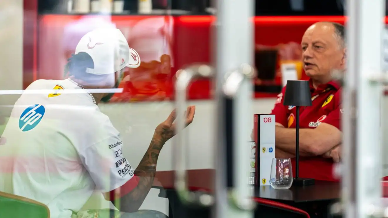 c-312 Lewis Hamilton speaking with Fred Vasseur