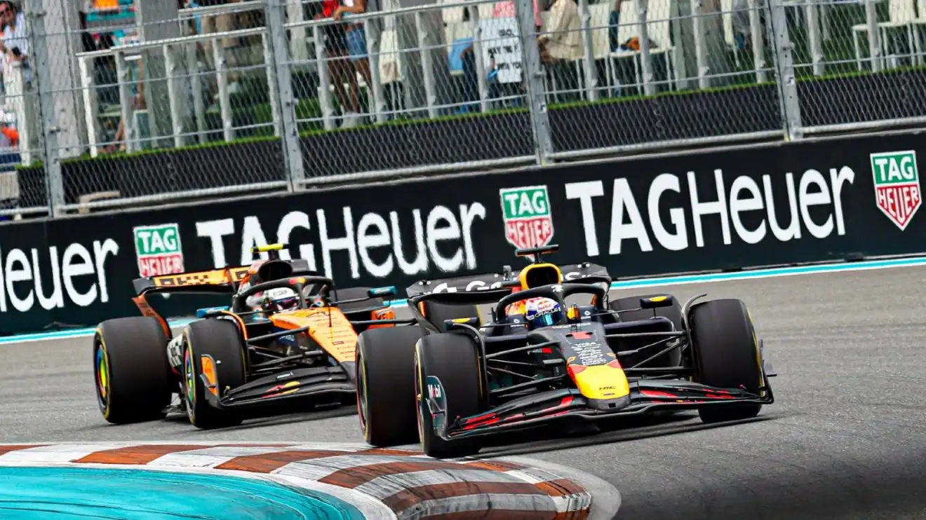 c-321 Red Bull's Max Verstappen and McLaren's Lando Norris battle in the 2025 Miami Grand Prix.