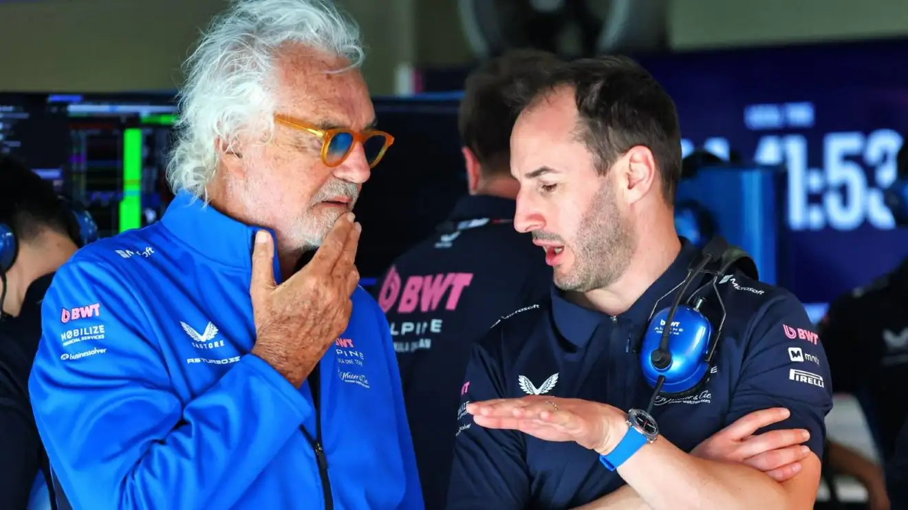 c-422 Alpine's Flavio Briatore pictured with Oliver Oakes at the 2025 Chinese Grand Prix.