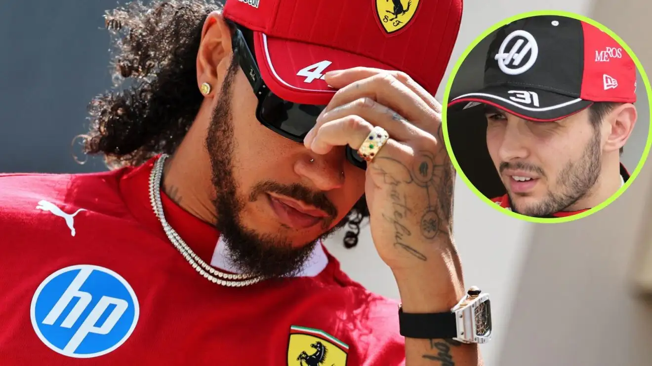 c-566 Ferrari's Lewis Hamilton adjusts his cap, as Haas driver Esteban Ocon looks his way from a circle top right