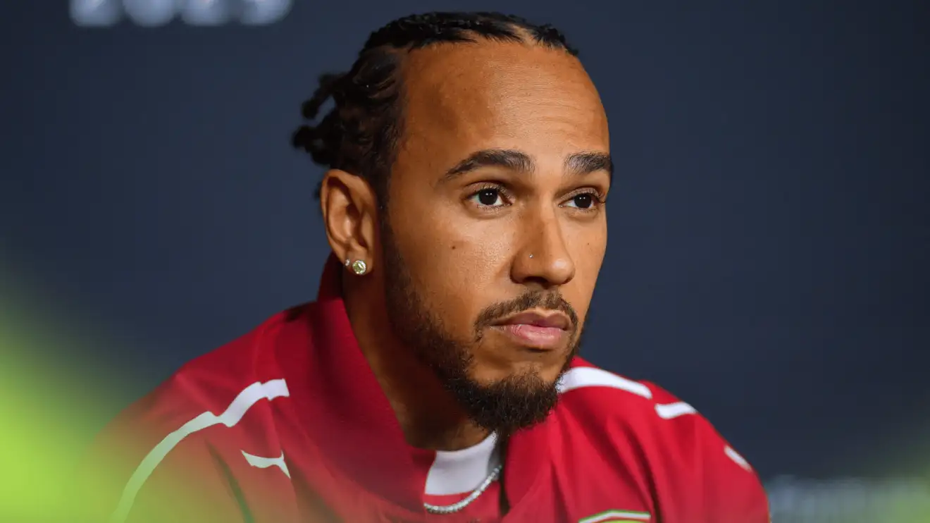 c-575 Lewis Hamilton looks blank in a press conference