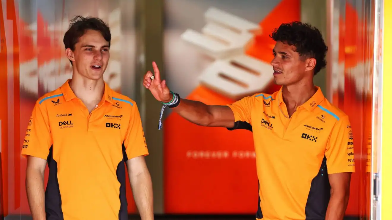 c-779 Lando Norris shows Oscar Piastri who is No.1