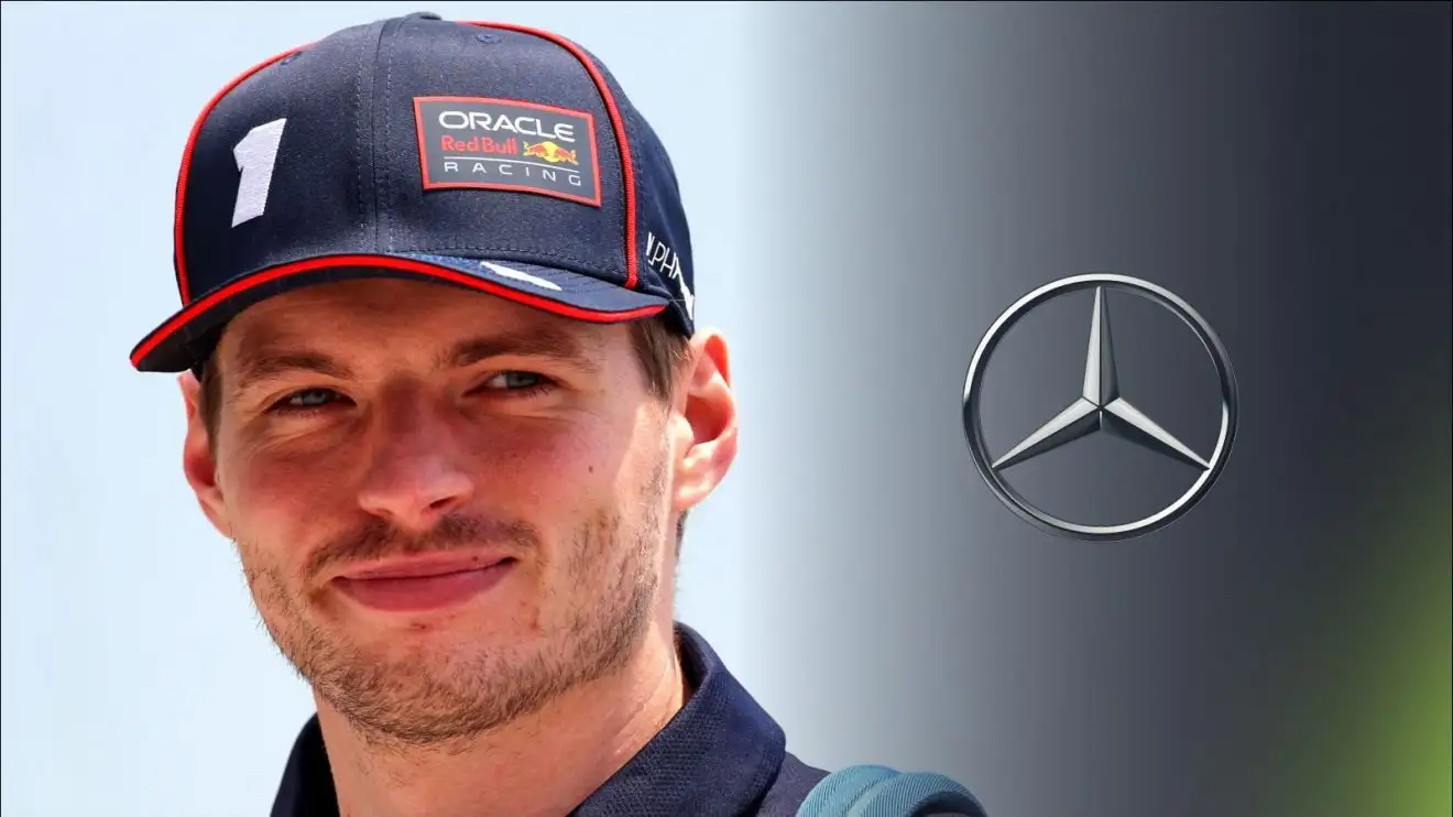 c-88 Red Bull's Max Verstappen smiling, with a Mercedes badge to his right