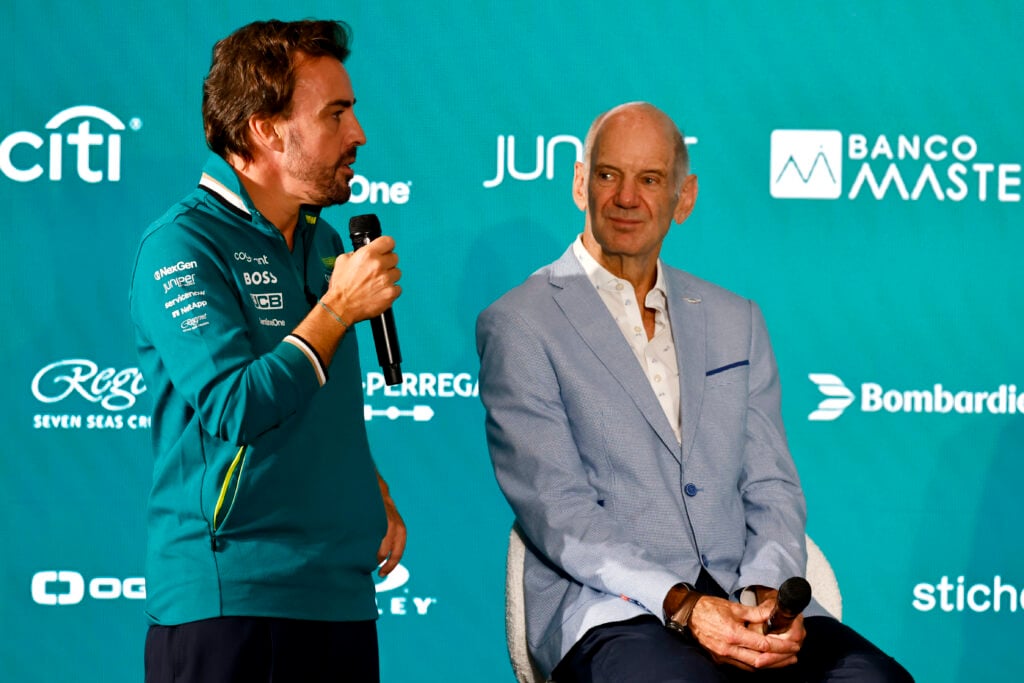 Fernando Alonso speaking alongside Adrian Newey at his announcement event at Aston Martin