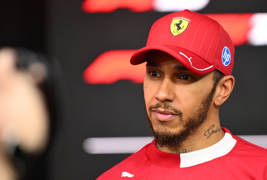 Ferrari driver Lewis Hamilton staring to the left of the camera during an interview at the Bahrain Grand Prix